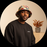 Circular portrait of influencer Steve Natto, a man with short dark hair and a confident expression, wearing a GRAFFIX garment